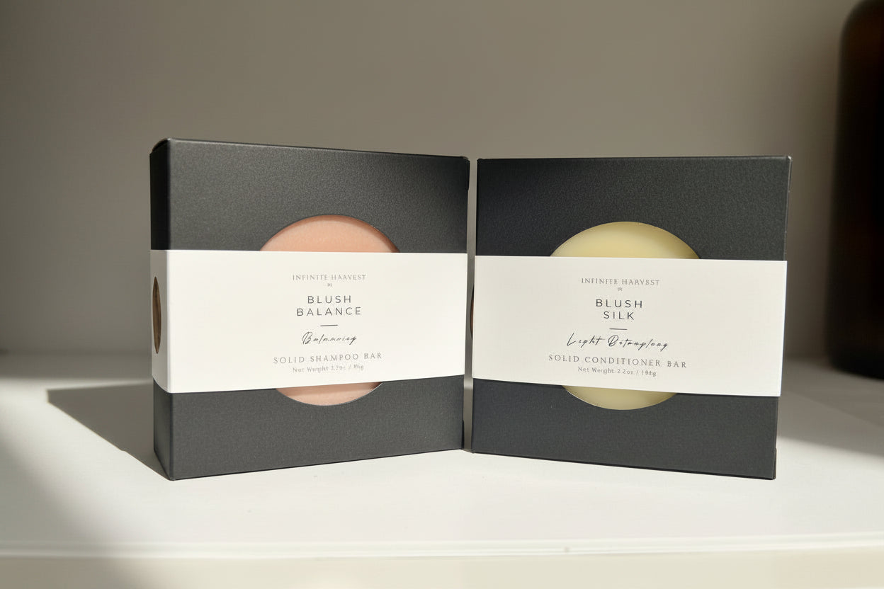 solid shampoo bar on the left called blush balance and solid conditioner bar on the right called blush silk. 
